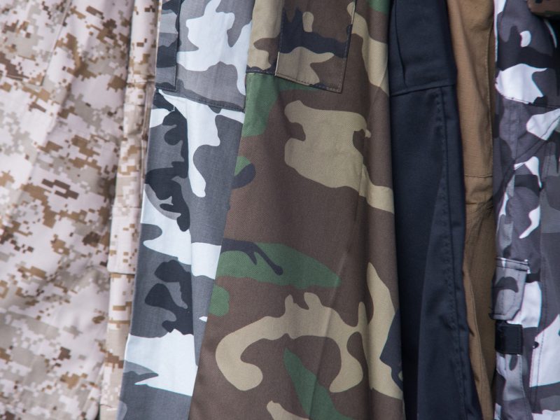 close up on mixed camo clothing of army